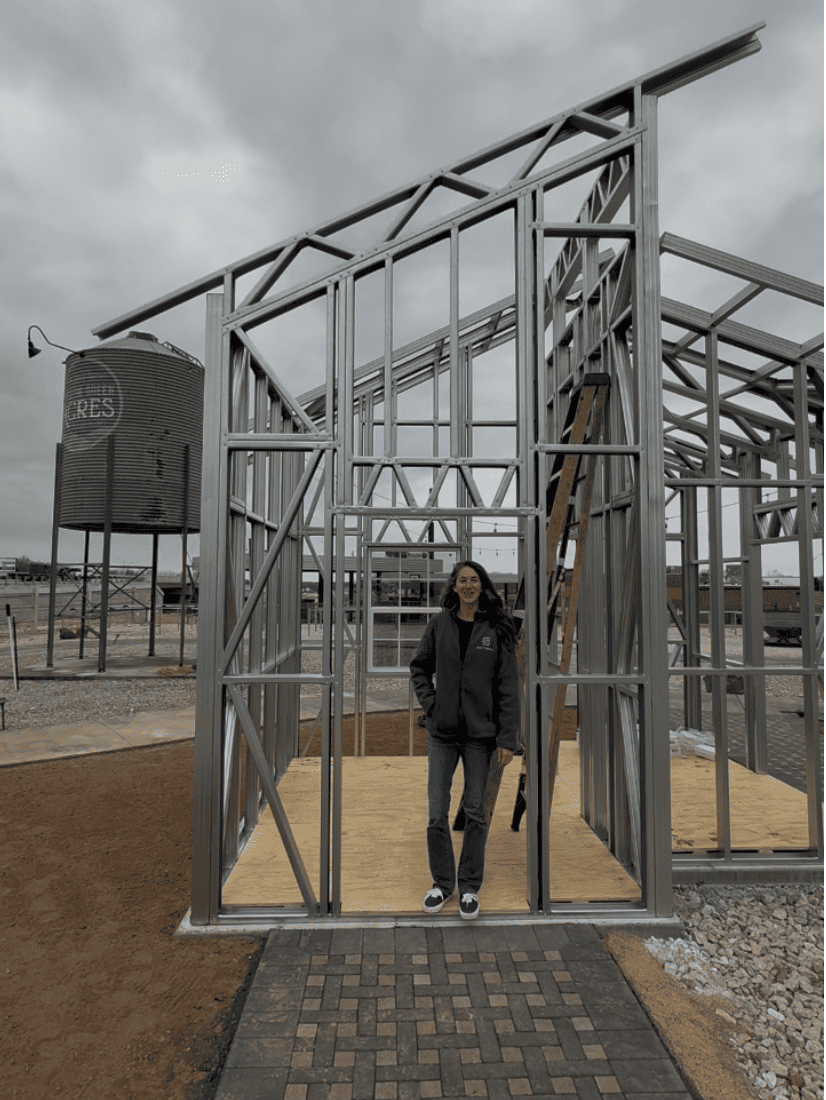 Real steel frame construction — person standing in door frame